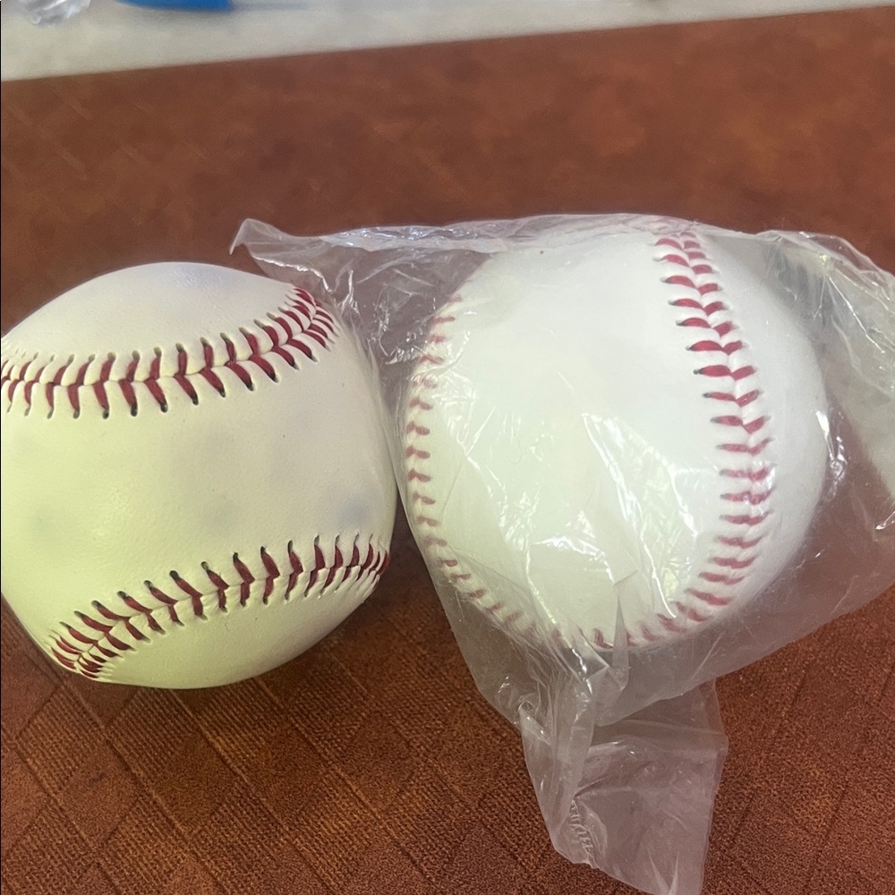 Pair of White Baseballs with Red Stitching